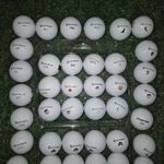 50CT Taylormade TP5/X Logo Bulk Lot Used Golf Balls - As Shown In Photos. Price: $200.00.