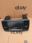 2005-2009 Subaru Outback Center Dash Trim Vent Bezel Clock Storage Oem Used. Price: $79.99.