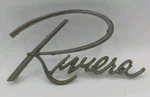 1963-1967 Buick Riviera Diecast Metal Fender Emblem, Part No. 1356961 Used. Price: $12.95.